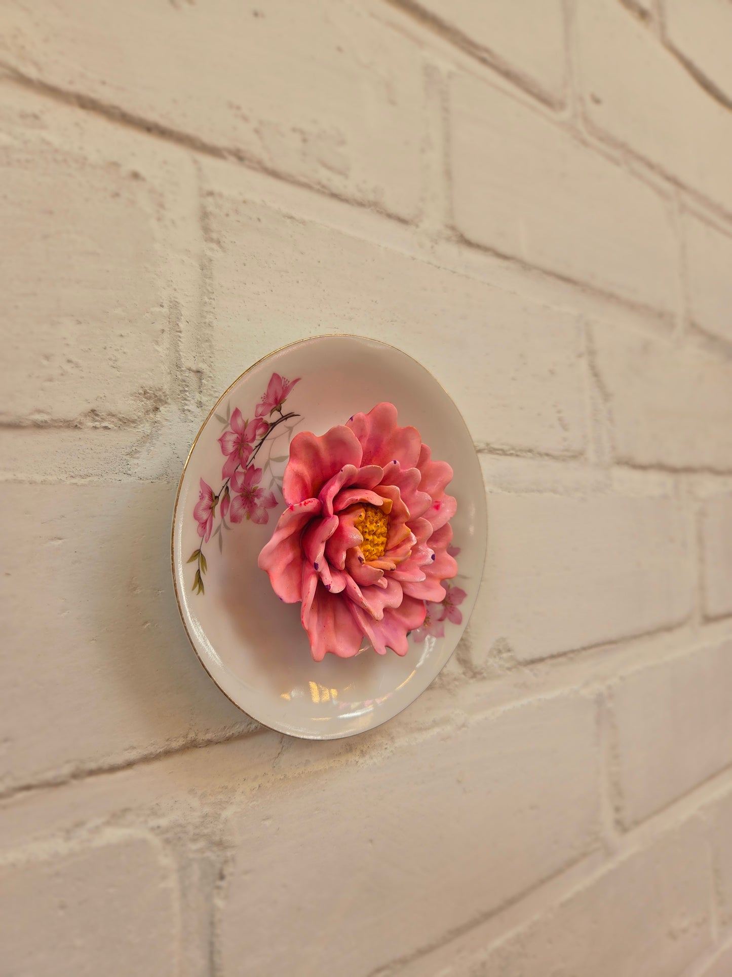 Wandbordje met roze bloem
