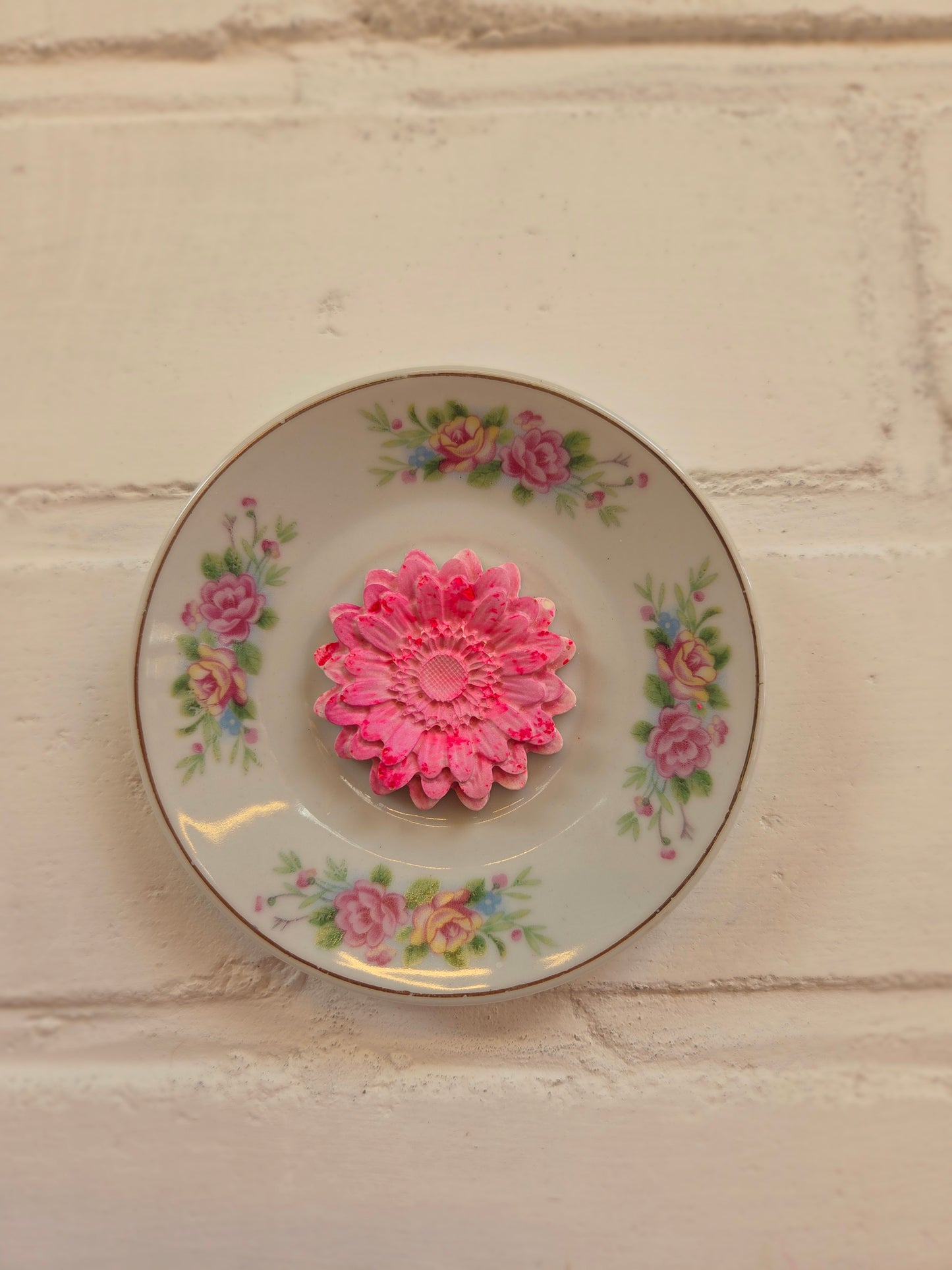 Wandbordje met roze bloem