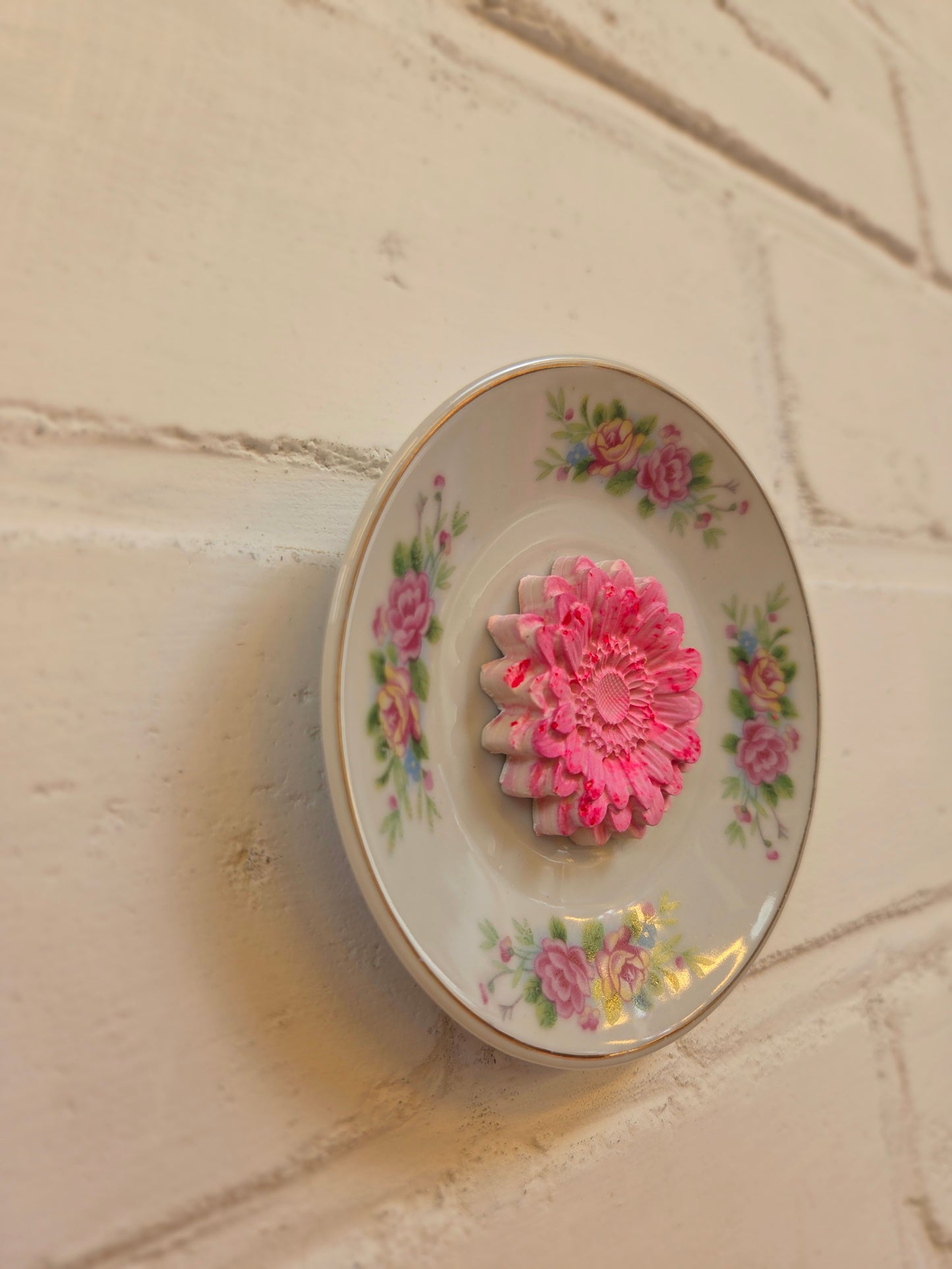 Wandbordje met roze bloem