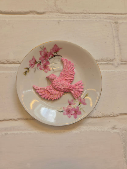 Wandbordje met roze vogel