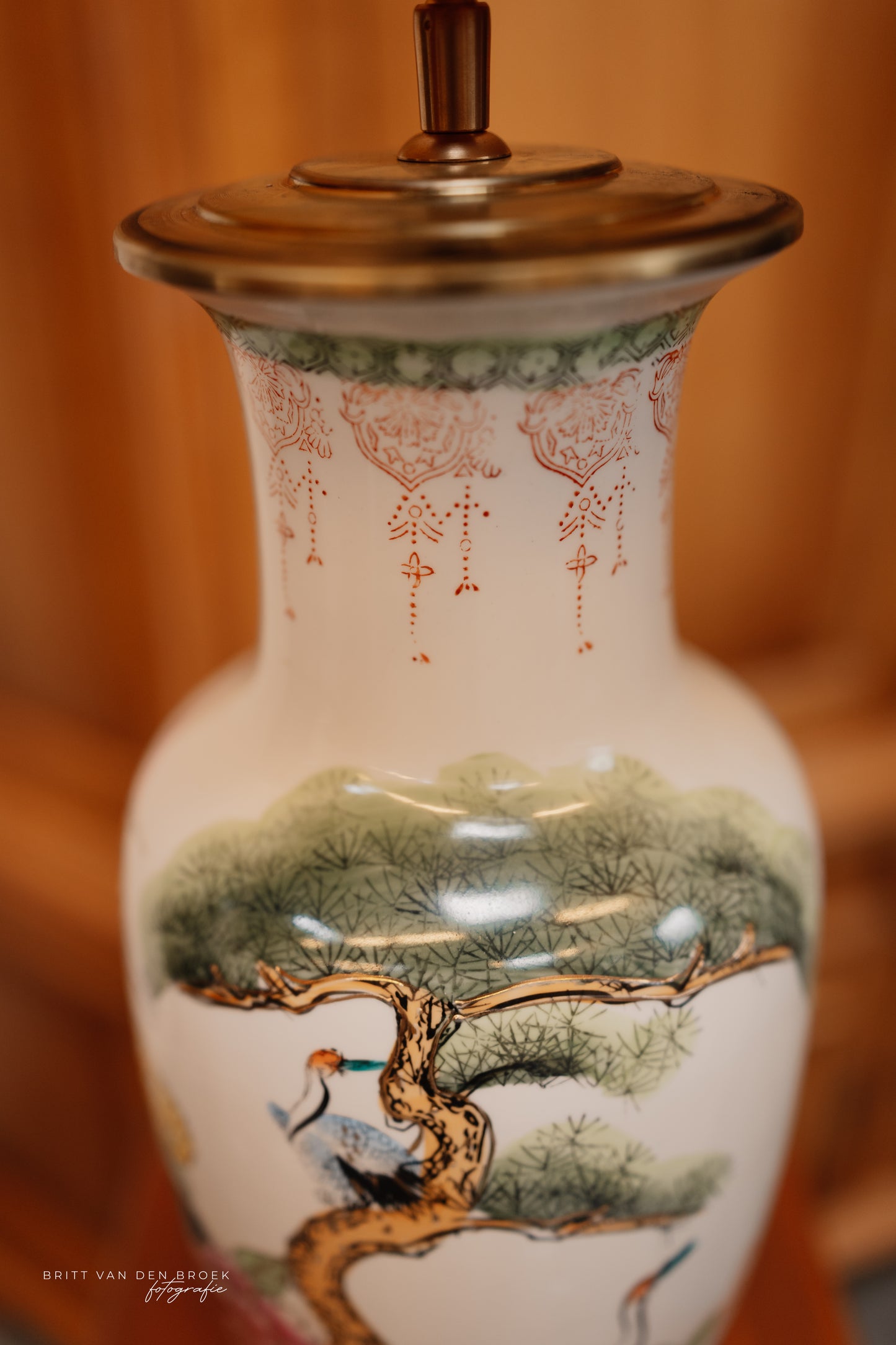 Grote vaaslamp met vogel