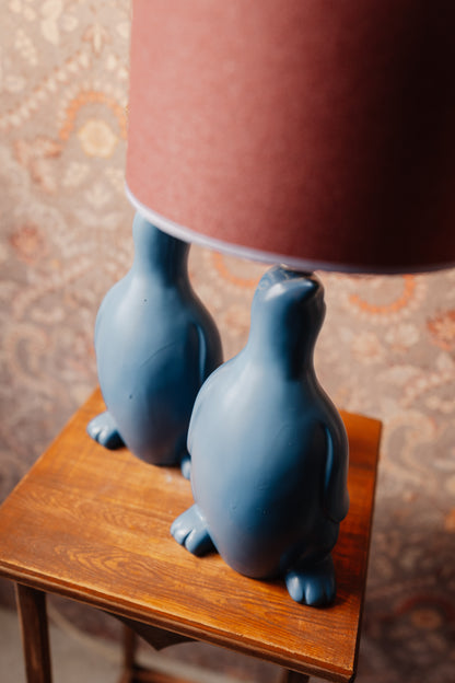 Lampenvoet pinguïn (links)